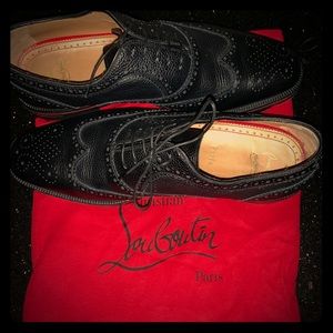 Black wingtip Christian Louboutin